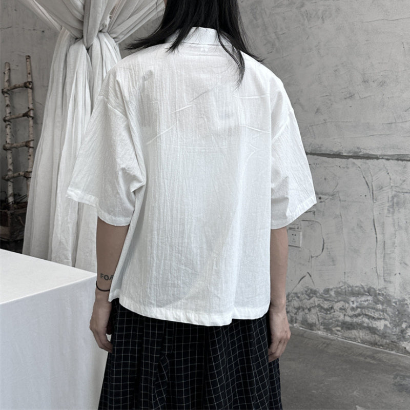 Slanted Buttoned Solid Color Irregular Shirt